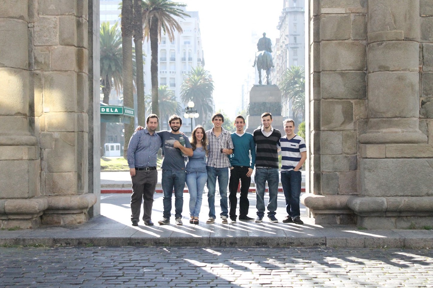 The team together outside, at the Ciudadela gate in Montevideo